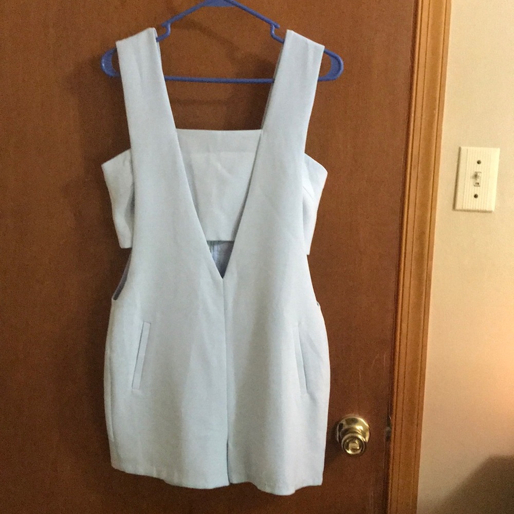 Light blue jumpsuit with cut out detail